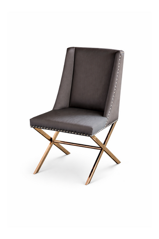 Gray upholstered chair with bronze metal legs.