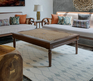 Center table madeup with the natural cane weaving top in a wooden frame.