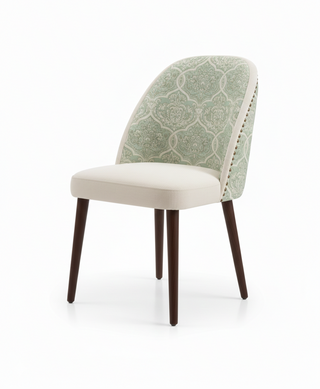 Dining chair with the patterned backrest.