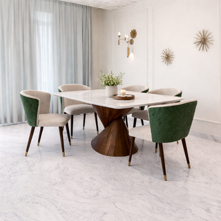 Modern dining room with a stylish table and chairs.