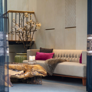 Modern living room with a beige sofa, decorative pillows, and a Natural Acashian  table.