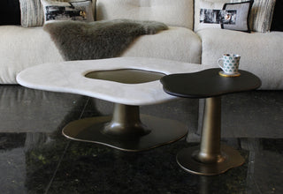 Modern coffee table with a unique design in a living room setting.