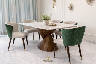 Dining room set with a modern table and chairs in a stylish interior.
